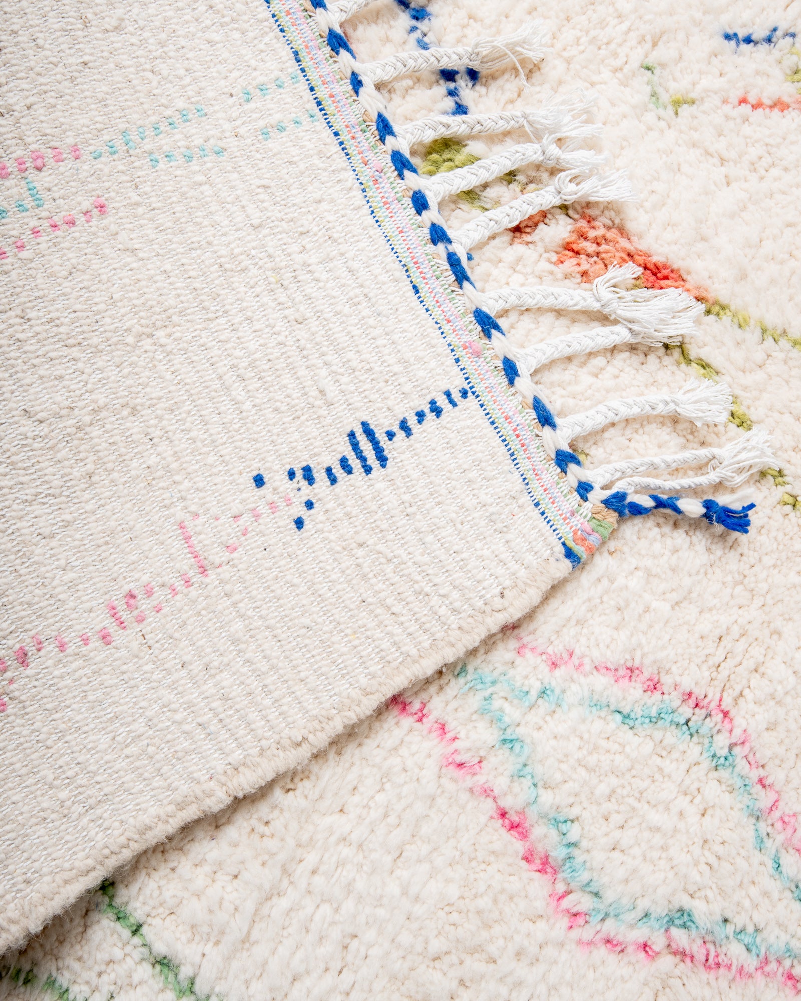 Modern, designer, handcrafted Berber rug from Morocco. Beniourain carpet with beautiful colours and patterns and fluffy wool texture.